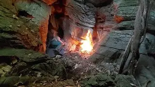Camp in a cave and cook alone in a cold waiting place