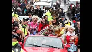 Anne Hathaway rides down Massachusetts Avenue for the Hasty Pudding Parade in Cambridge