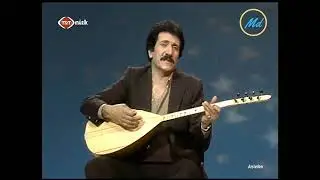 İzzet Altınmeşe - Bir Dilim İki Dilim Elma & Çakmağı Çak  ( Klip )