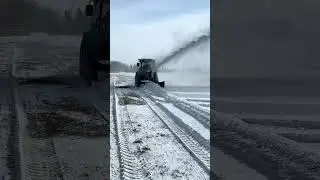MT 340 with a LS-LW3 front mount snow blower in action!