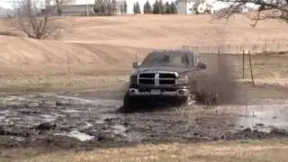 Stock Geo vs Lifted Dodge   (April Fools Mudding)
