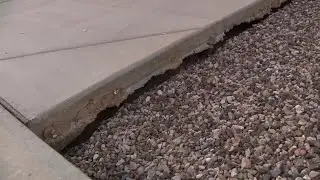 After storms, homeowners complain of sinking spots in their yards