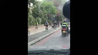 Cyclists in London, not obeying the road rules...again