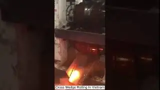 hot forging in Vietnam- heated metal bar into short working pieces using cross wedge rolling machine