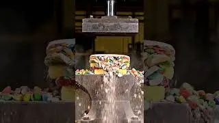 Hydraulic Press Crushing a Candy Tower Into Perfect Shards