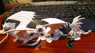 Здесь обитают драконы от Reaper Miniatures.