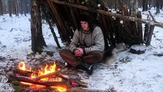 Building a Winter Survival Shelter Alone in the Snowy Forest