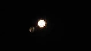 THE FULL WOLF MOON REFLECTING ON ITSELF(CAUSED BY OUR DOULBE- PANE WINDOW)