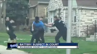 Battery suspect in court after hitting officers