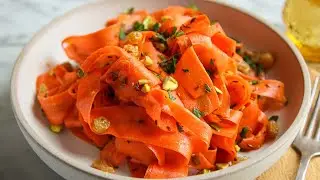 An Easy Carrot Ribbon Salad with Pickled Raisins ( Full recipe in caption )