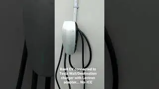 RAV4 EV connected to Tesla wall charger with Lectron adapter