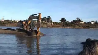 CAT 336E digger Rob Finlay taking away the causeway 28/may 15