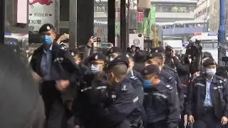 Hong Kong police arrest 6 journalists for sedition