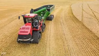 Case IH Quadtrac Pulling Brent 2096 Grain Cart Unloading on 2017 Peterbilt with 53' Tridem