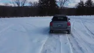 Porsche Cayenne Turbo in snow. DJI mini 2 drone footage.