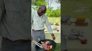 Anyone up for a bush breakfast? 🍳☕️ Our guide Chief cooking up a storm! #shorts #africanbushcamps