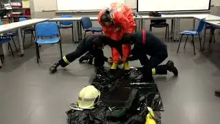 Riesgo quimico, preparación del traje.