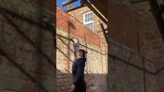 Timelapse: priming a brick wall for rendering | DIY Home improvement #shorts  #timelapse #rendering