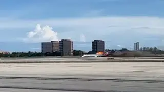 Cellphone video captures jetliner skidding across MIA tarmac