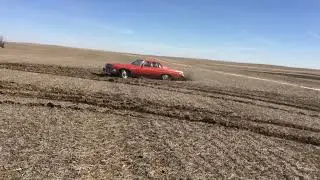 1972 Buick doing donuts in the field ￼
