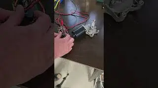 Wiper motor with speed regulator