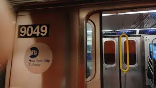 R160 #9049 (E) w/ Harry Potter ads leaving Jamaica - Van Wyck 