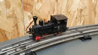 JUST FOR FUN! Running a Fleischmann H0 Black Anna on O scale tubular track