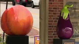 Ellicott City seeks removal of peach and eggplant art installations | NBC4 Washington