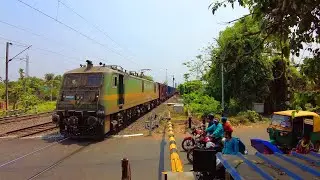 wag9 caring fully loaded freight train in a busy railgate people are wating to cross 😯