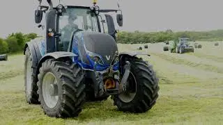 Round baling 2nd cut / Arable silage.Mid August.