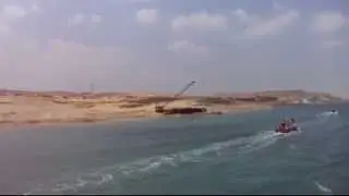 New Suez Canal: Dredging 95% of the saturated sand sand July 6, 2015