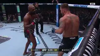 Jon Jones finishes Stipe with a spinning back kick to the body