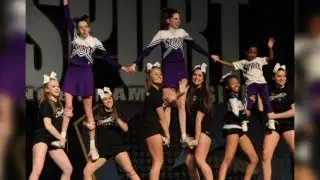 Special needs cheerleaders compete with team