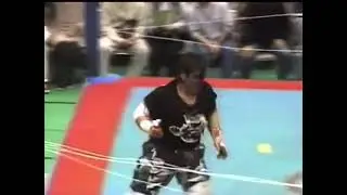 Onita finds a way to defend Mr Pogo's fire attack 