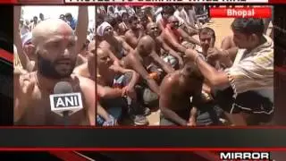 70 MP Gov ambulance staff workers shave heads in protest - The News
