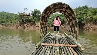Girl living alone on island designs bamboo boat for transportation on island. L&yacute; Thị Hoa