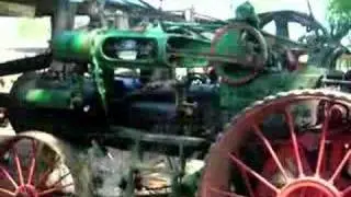 Case steam traction engine sawing cedar planks