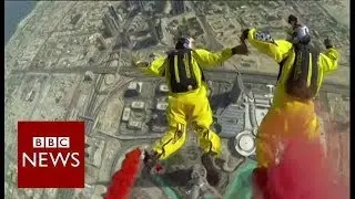 Record breaking base jump from world's tallest building - BBC News