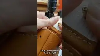 Pose de sangle par rivets sur un sac en cuir