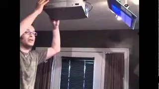 How we setup our LCD projector to reflect onto the kitchen table for gaming.