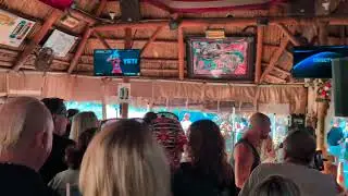 '80s hair band on the beach. Cheap food, cold beer