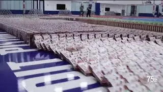 Breaking a record: Move For Hunger topples 12,952 boxes of cereal like dominoes