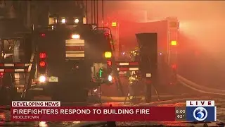 Video: Crews working to put out fire at Middletown trash pickup business