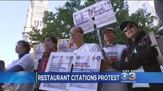 Asian Business Owners Protest City's Restaurant Citations