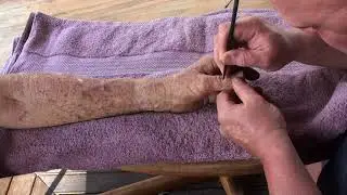Hand massage Brandon Raynor working on Brian's hand