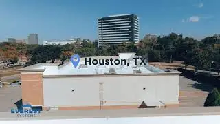 Polyurethane Spray Roofing System Applied Over Asphalt Cap Sheet Roof