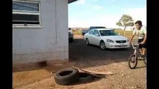 ron harding NAVAJO BOY crashing his bike on gravel