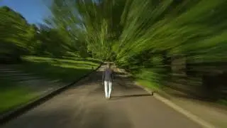 Man walking in the park in time lapse  - no copyright