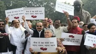 Congress MPs protest at Parliament premises over rising onion prices