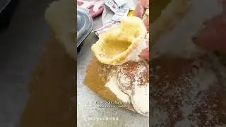 Trying the famous Mickey Mouse Beignets